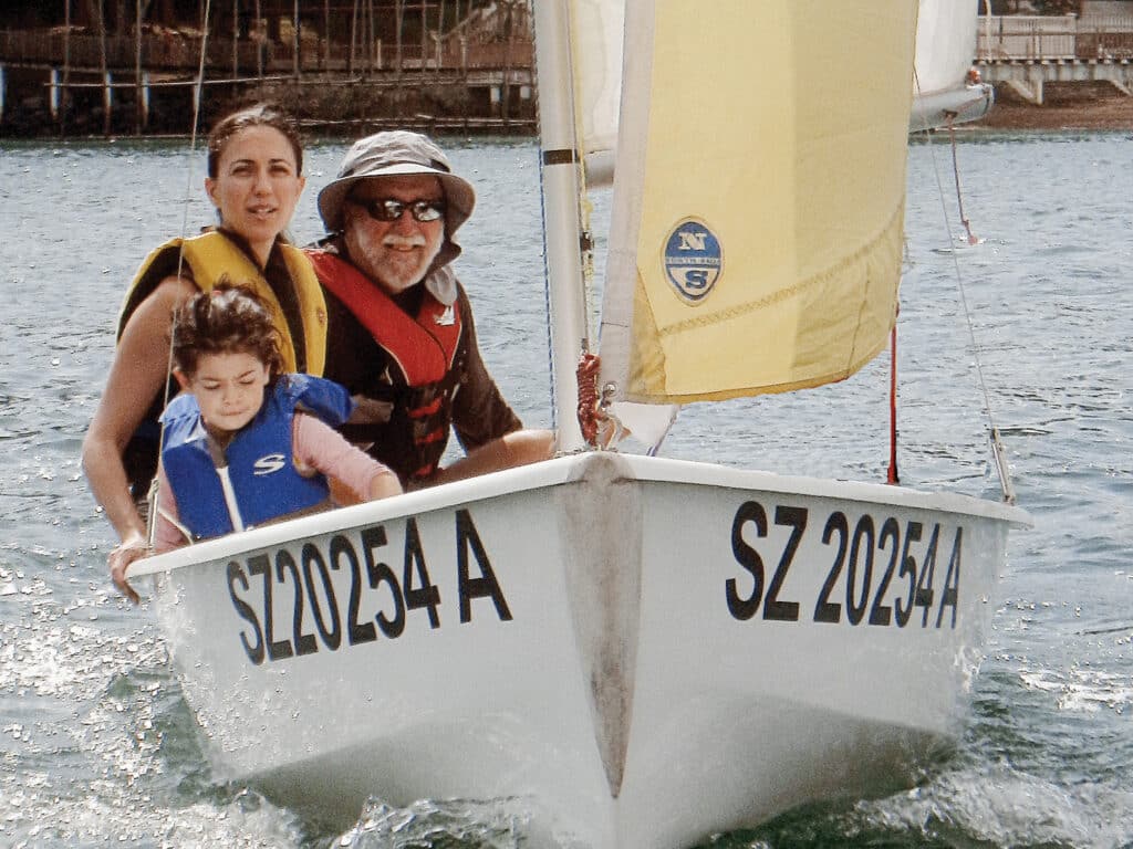 Fatty with family on a dinghy