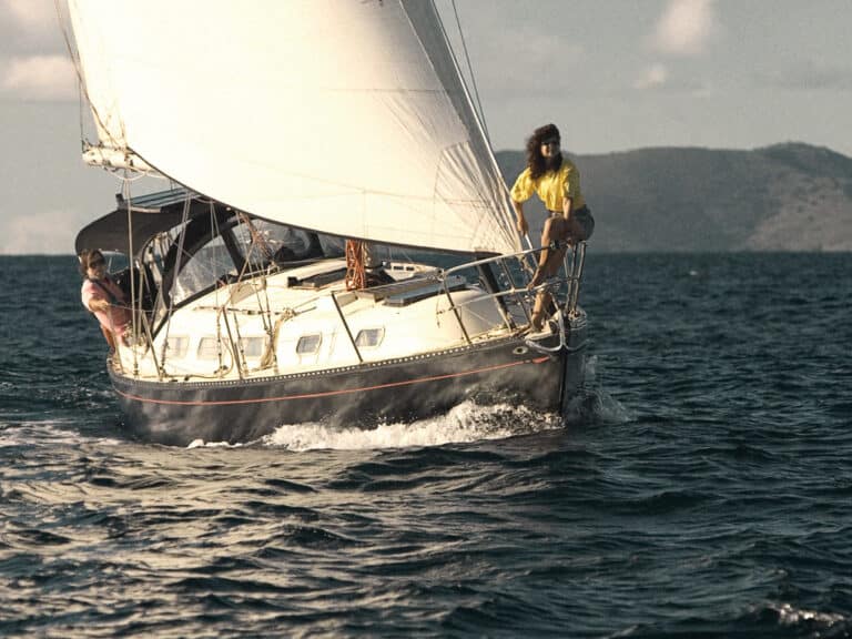 Wild Card sailboat with Jost Van Dyke in the background